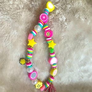 Handmade polymer clay beaded phone charm